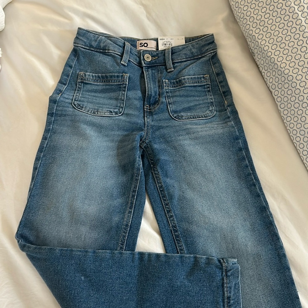 NWT SO wide leg jeans with patch front pockets.
